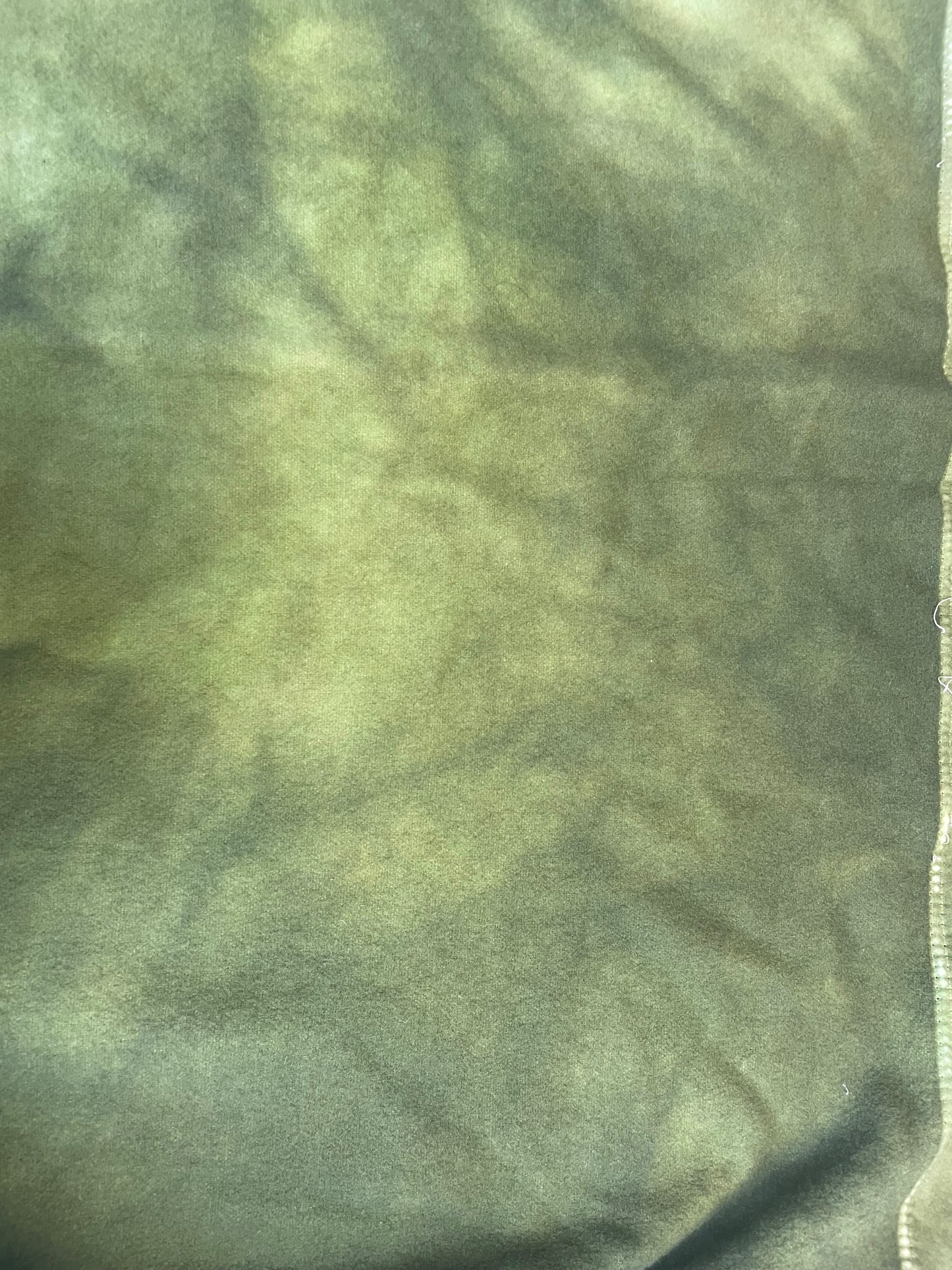 Close-up of green woollen covers