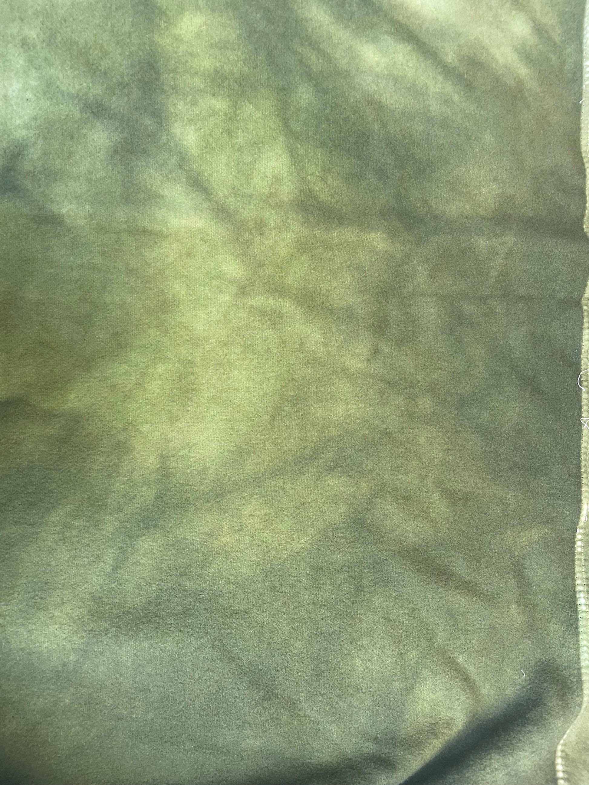 Close-up of green woollen covers